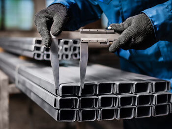 Measuring a piece of steel for a job in Colombia